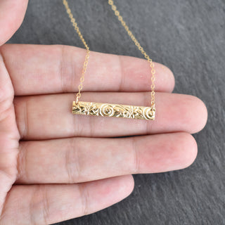 Patterned Hawaiian heirloom-style bar necklace by Yay Hawaii featuring tropical-inspired design and intricate metalwork.