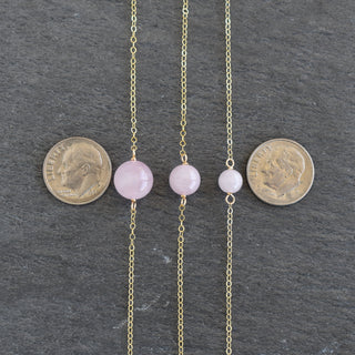 Single rose quartz station necklace by Yay Hawaii featuring 6mm, 8mm, or 10mm beads on a delicate chain.