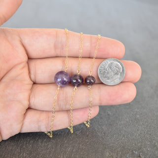Amethyst gemstone station necklace by Yay Hawaii with 6mm, 8mm, or 10mm beads showcasing vibrant purple stones on a delicate chain.