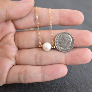 Dainty 8mm white pearl station necklace by Yay Hawaii featuring evenly spaced lustrous pearls on a delicate chain