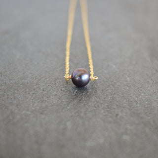 Black freshwater pearl station bar necklace with 8mm pearls on a sleek chain, stylish jewelry by Yay Hawaii.