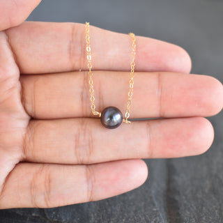 Black 8mm freshwater pearl station bar necklace by Yay Hawaii, featuring a sleek minimalist design on a delicate chain.