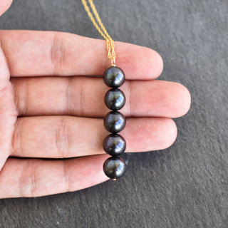 Freshwater pearl necklace featuring five statement pearls by Yay Hawaii, close-up of elegant white pearls on a delicate chain