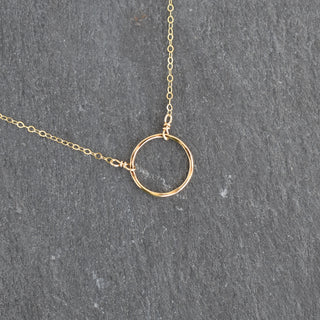 Textured hoop station necklace by Yay Hawaii featuring multiple small hoops on a delicate chain.