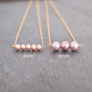 Tiny 4mm light purple seed pearl station necklace from Yay Hawaii, featuring small, delicate pearls on a fine chain.