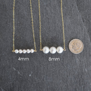 Tiny 4mm white seed pearl station necklace by Yay Hawaii featuring small, round pearl beads along a delicate chain.