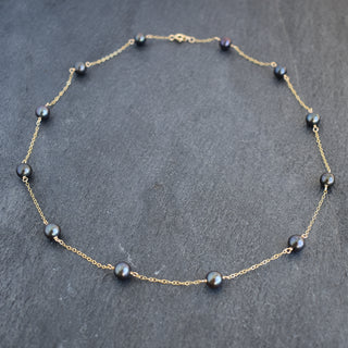 Dainty 8mm black freshwater pearl station necklace from Yay Hawaii, featuring evenly spaced lustrous pearls on a delicate chain.