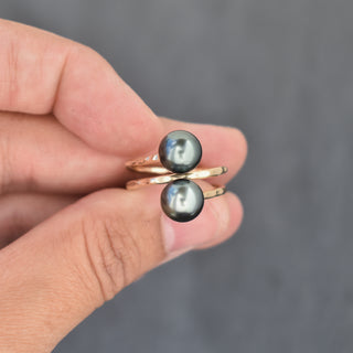 Tahitian Pearl Double Bypass Ring by Yay Hawaii featuring black pearls and sterling silver band on a white background.