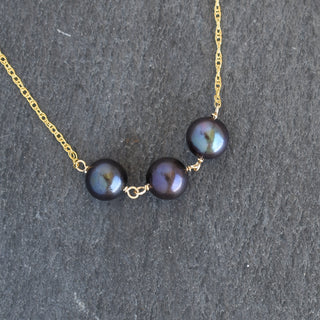 Black pearl station necklace by Yay Hawaii featuring three black pearls on a delicate chain.