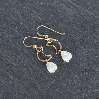 Crescent moon earrings by Yay Hawaii featuring small mother of pearl Pikake flower details, silver-tone metal jewelry.