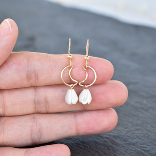 Yay Hawaii crescent moon earrings with small mother of pearl Pikake flower, delicate jewelry accessory featuring moon and floral design.