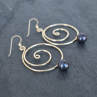 Large black pearl spiral earrings by Yay Hawaii featuring elegant, swirling pearl designs on a silver-tone hook.