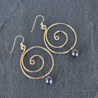 Large black pearl spiral earrings by Yay Hawaii, featuring elegant dangling design and shiny pearl accents.
