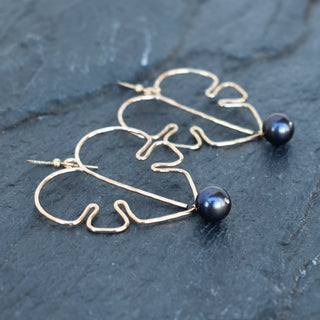 Extra large Monstera leaf earrings with black pearls in silver or gold, stylish and tropical-inspired jewelry by Yay Hawaii.