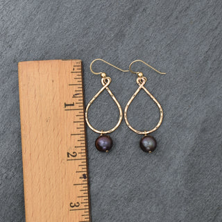 Small black pearl teardrop hoop earrings by Yay Hawaii featuring elegant teardrop-shaped black pearls on hoop earrings.