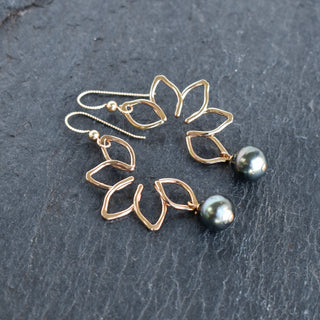 Large Naupaka earrings by Yay Hawaii featuring intricate floral design and silver finish on dangling earrings.