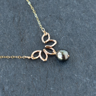 Small Naupaka necklace from Yay Hawaii featuring delicate floral design on a fine chain.