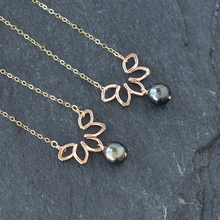 Small Naupaka necklace by Yay Hawaii featuring a delicate floral pendant on a thin cord.