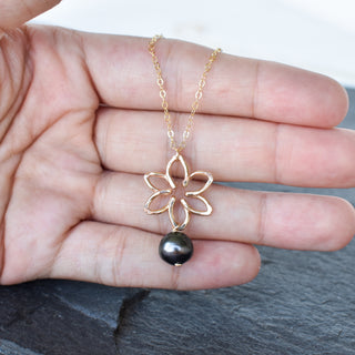 Small Tiare necklace by Yay Hawaii featuring a dangling pearl and tropical flower pendant, perfect for Hawaiian-inspired jewelry.