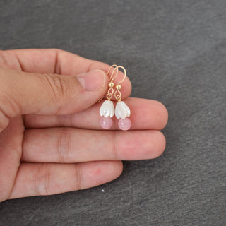 Dainty 6mm rose quartz cluster with small mother of pearl Pikake flower, showcasing natural pink crystal and delicate shell details.