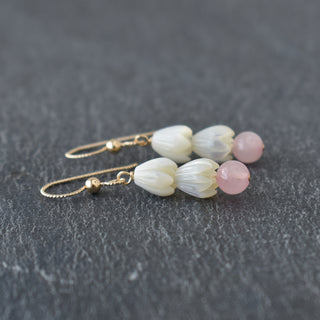 Double small mother of pearl Pikake flower cluster with 6mm rose quartz bead, crafted by Yay Hawaii, showcasing intricate floral jewelry details.