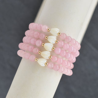Small 6mm rose quartz stretchy bracelet featuring Pikake flower charm, by Yay Hawaii, perfect for delicate jewelry styling.