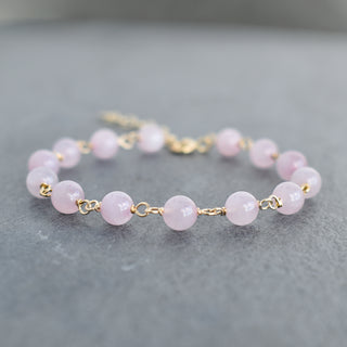Linked rose quartz bracelet with extender by Yay Hawaii, featuring polished pink gemstone beads and adjustable chain.