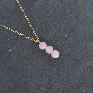 Yay Hawaii triple 6mm rose quartz vertical cluster pendant necklace featuring a delicate silver chain and polished pink quartz stones.