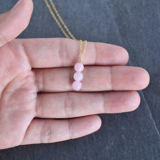 Yay Hawaii Triple 6mm rose quartz vertical cluster pendant necklace with silver chain, showcasing pink gemstone beads and elegant design.