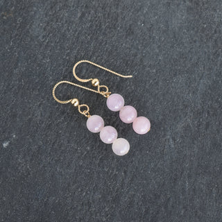Triple 6mm rose quartz cluster earrings by Yay Hawaii featuring pink quartz stones on silver hooks.