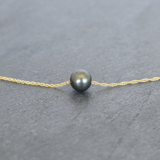 Round Tahitian pearl pendant on a double rope chain necklace by Yay Hawaii, showcasing the elegant jewelry design.