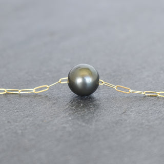 Round Tahitian pearl pendant on a paperclip chain necklace by Yay Hawaii, showcasing a sleek, modern jewelry design.