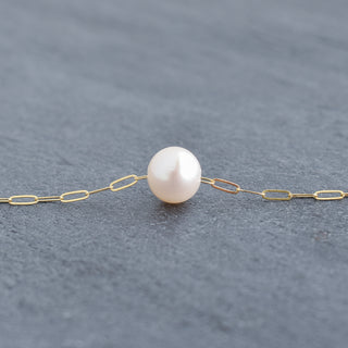 White freshwater pearl necklace with paperclip chain by Yay Hawaii, close-up of elegant jewelry on a neutral background.