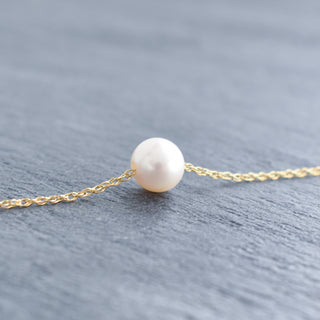 White freshwater pearl necklace with double rope chain from Yay Hawaii, featuring a sleek and elegant jewelry design.