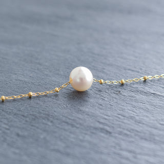 White freshwater pearl necklace with satellite chain by Yay Hawaii, featuring a delicate, elegant design and secure clasp.