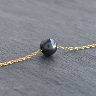 Black freshwater pearl necklace with double rope chain from Yay Hawaii, detailed close-up of the elegant jewelry piece.