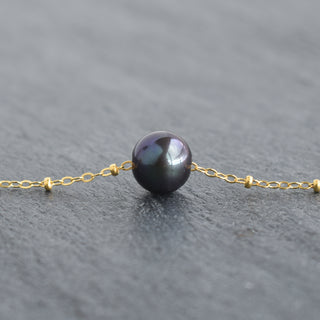 Black freshwater pearl necklace with satellite chain from Yay Hawaii, featuring a sleek, elegant design and multiple pearl strands.