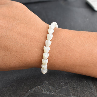 Pink Pikake stretchy bracelet by Yay Hawaii featuring floral beads, suitable for adults and children, on a neutral background.