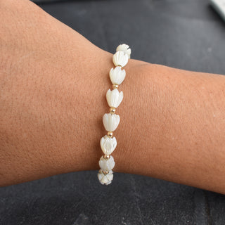 Yay Hawaii Pikake and metal bead accent stretchy bracelet in adult and child sizes, featuring floral and metallic design.