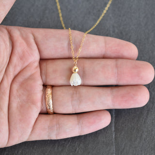 Small mother of pearl Pikake pendant necklace with 4mm accent bead, featuring Yay Hawaii jewelry design.