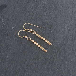 Yay Hawaii modern metal beaded minimalist stick earrings with sleek design and subtle accents, perfect for contemporary jewelry styles.