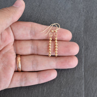 Yay Hawaii modern metal beaded minimalist stick earrings with sleek design and contemporary style.