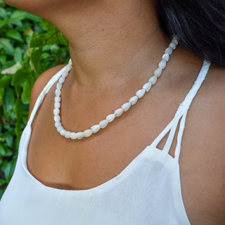 Mother of Pearl Pikake Strand Necklace by Yay Hawaii, featuring elegant white Pikake flower-shaped pearls on a delicate necklace.