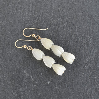 Triple medium Dangle Pikake earrings by Yay Hawaii featuring white floral design with gold hooks.