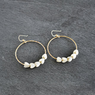 Large gold hoop earrings with small pikake flower charms, stylish jewelry from Yay Hawaii.