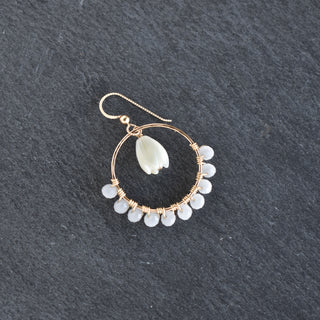 Medium gold hoops with crystal glass beads and a center hanging mother of pearl Pikake flower for a tropical jewelry look.