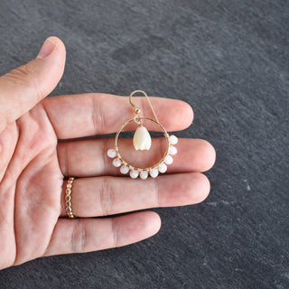 Medium Yay Hawaii hoops with crystal glass beads and a mother of pearl Pikake flower hanging in the center.