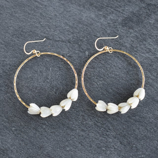 Large Yay Hawaii hoops with small Pikake flower charms, featuring gold-tone metal and floral accents.