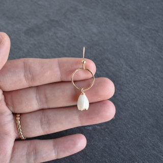 Small gold hoop earrings with medium Pikake flower charms from Yay Hawaii, showcasing tropical floral jewelry style.