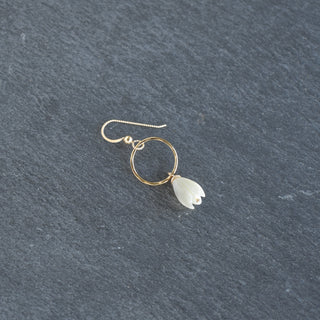 Small gold hoop earrings with medium Pikake flower charms from Yay Hawaii, featuring delicate floral design.